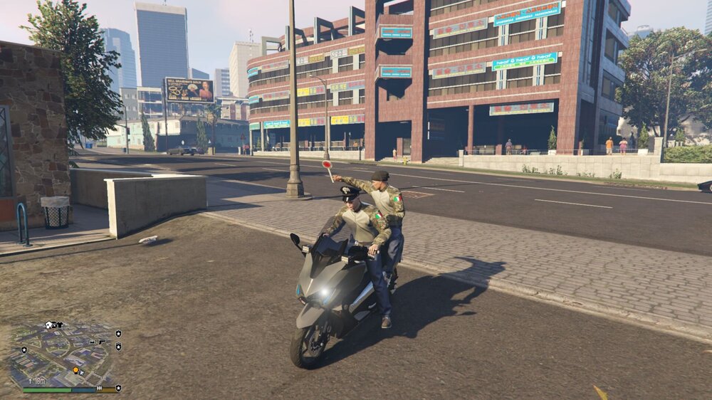 Could contain: outdoor, wheel, building, vehicle, land vehicle, sky, road, tire, tree, ground, motorcycle, scooter, street, riding, city