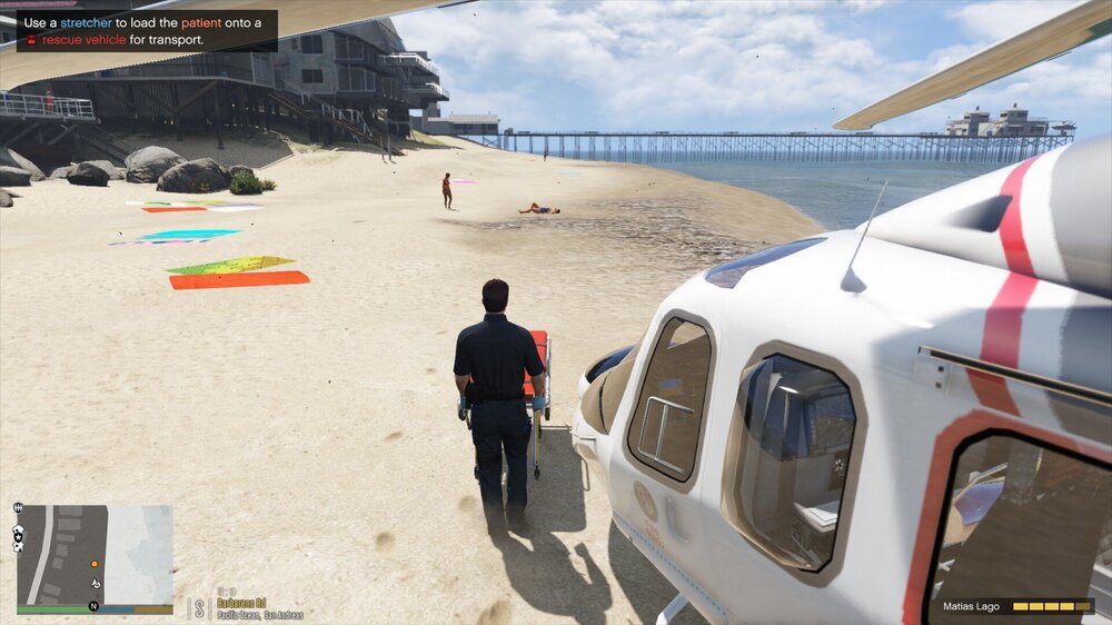 Could contain: vehicle, outdoor, helicopter, transport, text, sky, ground, helicopter rotor, rotorcraft, aircraft, beach, plane, person