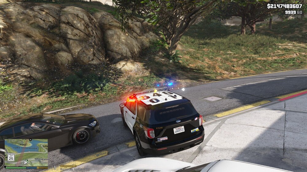 Could contain: vehicle, outdoor, land vehicle, text, wheel, road, tire, vehicle registration plate, auto part, motor vehicle, transport, street, ground, police, car