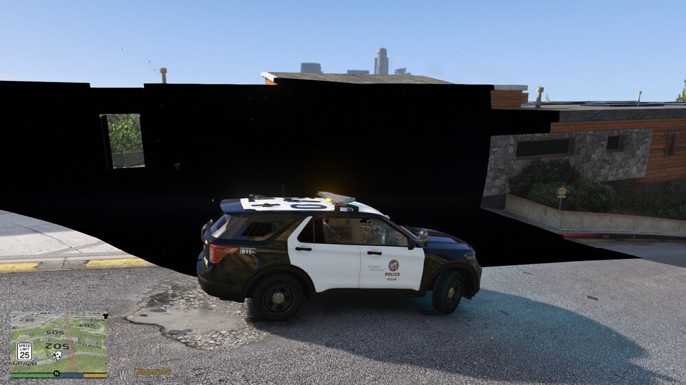 Could contain: vehicle, outdoor, land vehicle, tire, wheel, sky, ground, auto part, transport, road, car, parked, police