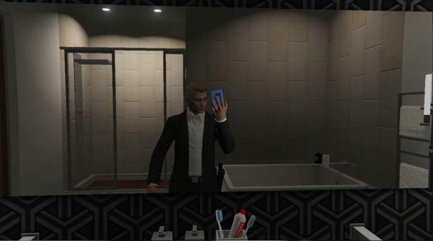 Could contain: indoor, wall, man, clothing, suit, person, bathroom, toilet