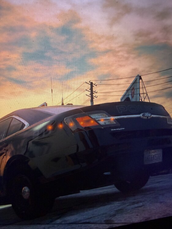 Could contain: vehicle, land vehicle, outdoor, sky, wheel, tire, transport, auto part, car, sunset, sun, parked, ground, plane