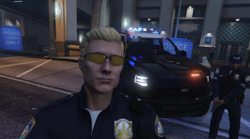 Could contain: human face, vehicle, land vehicle, clothing, person, car, man, tire, outdoor