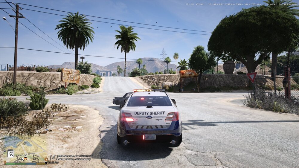 Could contain: outdoor, land vehicle, vehicle, text, sky, wheel, tree, road, vehicle registration plate, tire, plant, motorsport, palm tree, automotive design, car, ground, street, rally