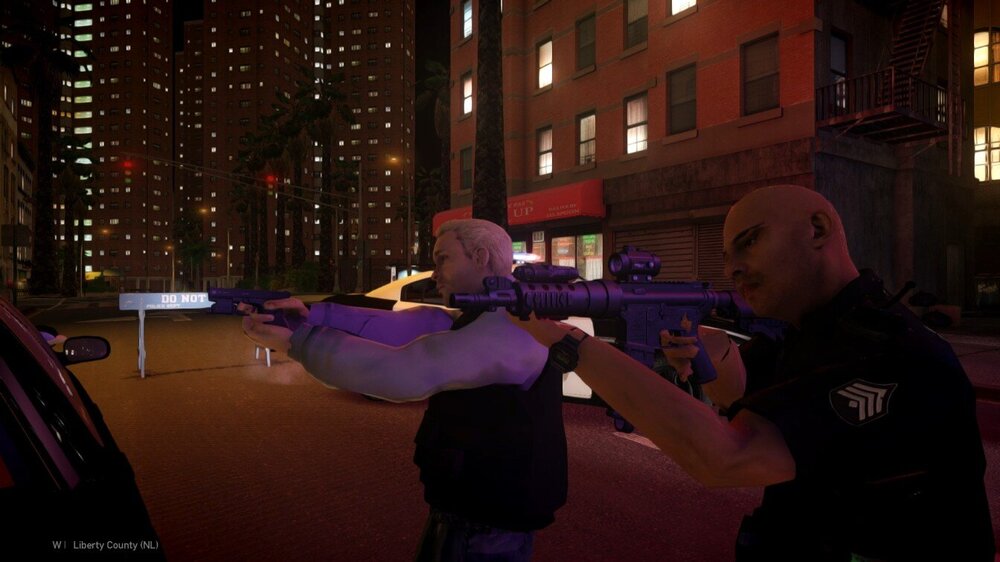 Could contain: building, person, clothing, weapon, man, purple, night