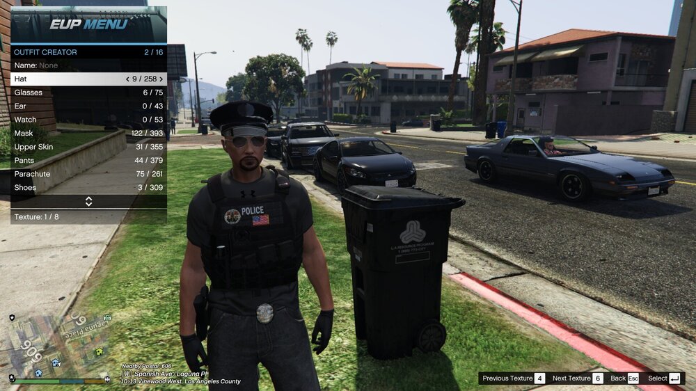 Could contain: text, outdoor, land vehicle, vehicle, car, clothing, wheel, tree, person, grass, police, officer