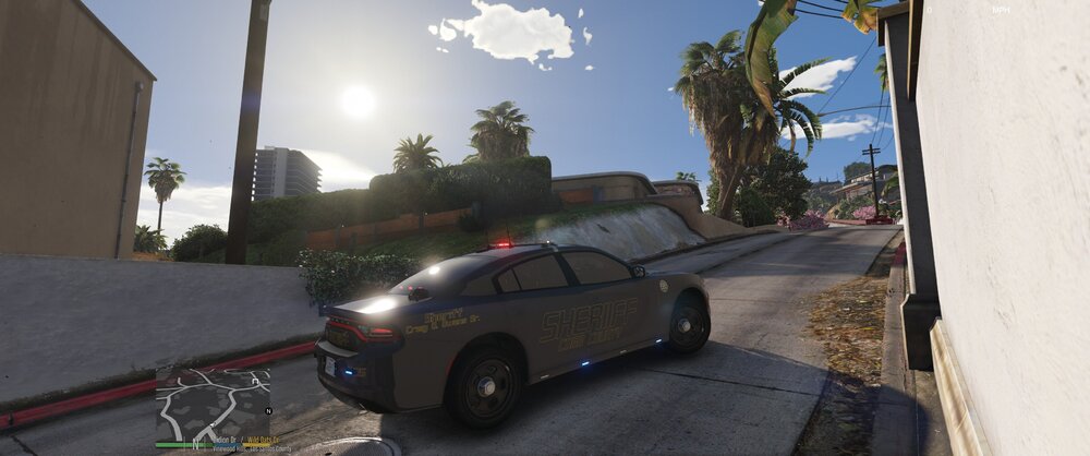 Could contain: vehicle, land vehicle, sky, outdoor, wheel, tire, car, transport, road, ground, street, parked