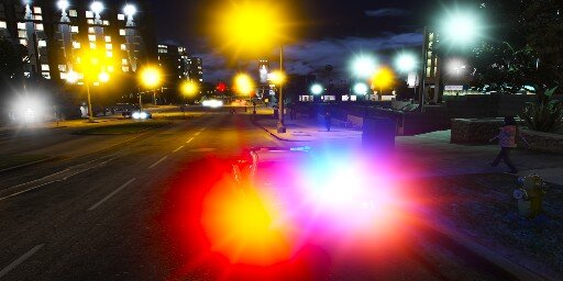 Could contain: outdoor, sky, street light, road, light, street, lens flare, night, city