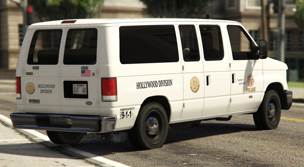 Could contain: vehicle, land vehicle, transport, wheel, outdoor, text, van, vehicle registration plate, motor vehicle, auto part, compact van, mode of transport, minibus, car, tire, minivan, light commercial vehicle, automotive exterior, road, police, street, parked