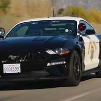 Could contain: vehicle, land vehicle, wheel, transport, car, outdoor, tire, text, automotive design, sports car, luxury vehicle, performance car, auto part, sports sedan, mid-size car, alloy wheel, road, personal luxury car, coupa, bumper, full-size car, sedan, rim, automotive exterior, grand tourer, spoiler