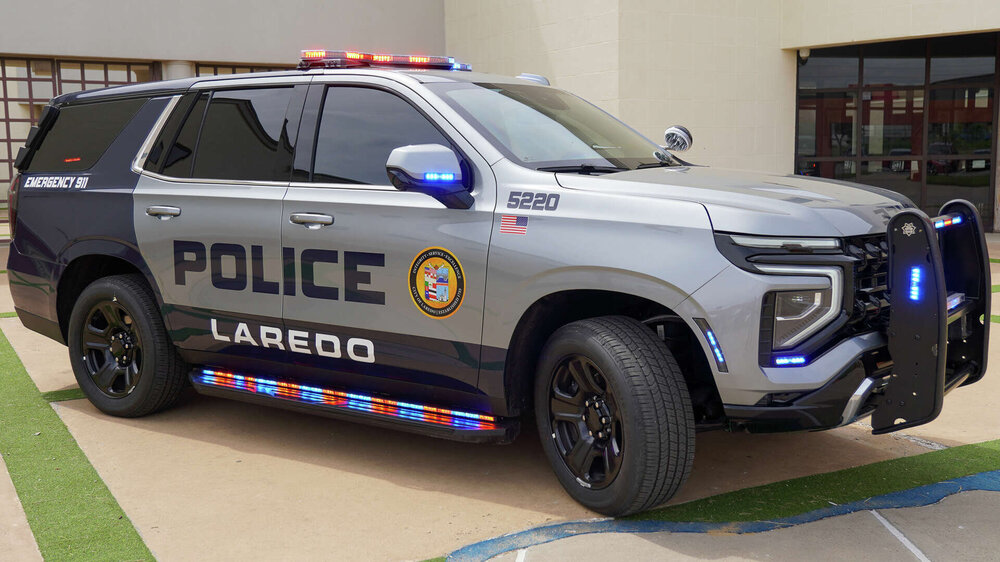 Could contain: vehicle, land vehicle, wheel, text, tire, transport, law enforcement, bumper, police car, ford, sport utility vehicle, auto part, car, emergency vehicle, emergency service, police, compact sport utility vehicle, vehicle registration plate, automotive exterior, ford motor company, mitsubishi, roof rack, crossover suv, motor vehicle, full-size car, outdoor, emergency, parked