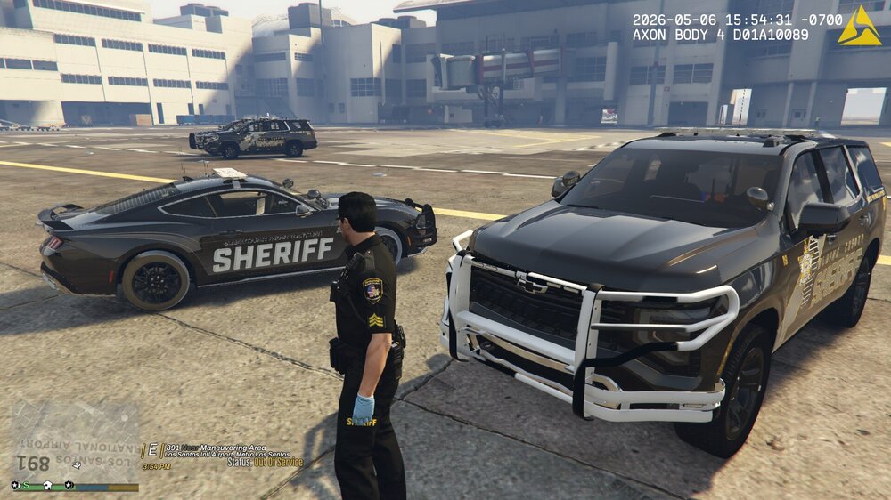 Could contain: vehicle, land vehicle, wheel, tire, outdoor, transport, text, ground, car, auto part, road, police, parked