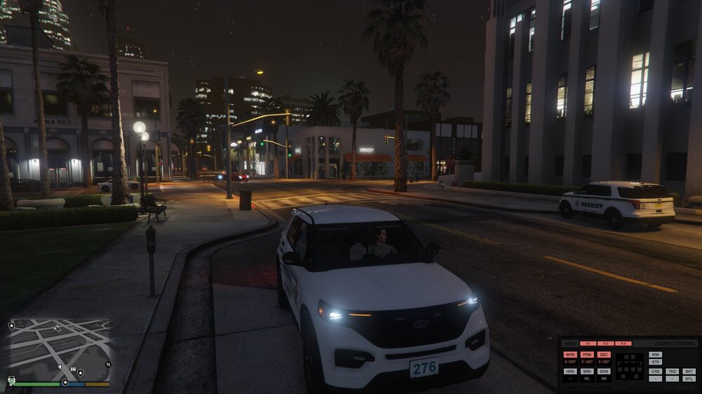 Could contain: vehicle, land vehicle, outdoor, wheel, building, screenshot, road, street, light, car, city, night