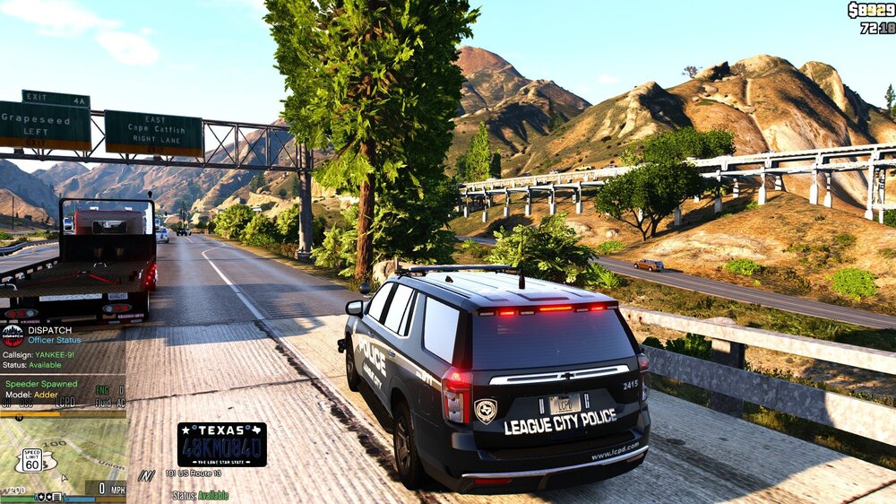 Could contain: vehicle, land vehicle, outdoor, text, wheel, sky, tire, vehicle registration plate, sport utility vehicle, road, mountain, track, car, bridge
