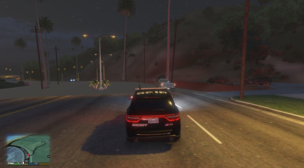 Could contain: vehicle, land vehicle, wheel, outdoor, road, screenshot, sky, car, night, street