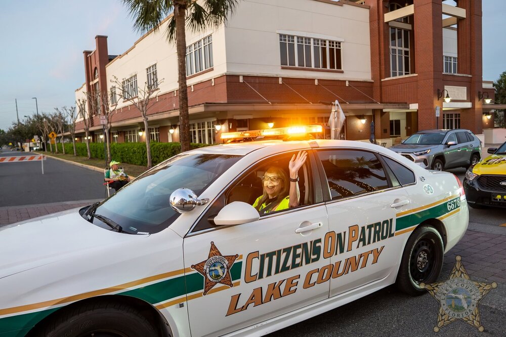 Could contain: vehicle, land vehicle, outdoor, text, wheel, transport, car, police car, full-size car, tire, sedan, road, mid-size car, police, street