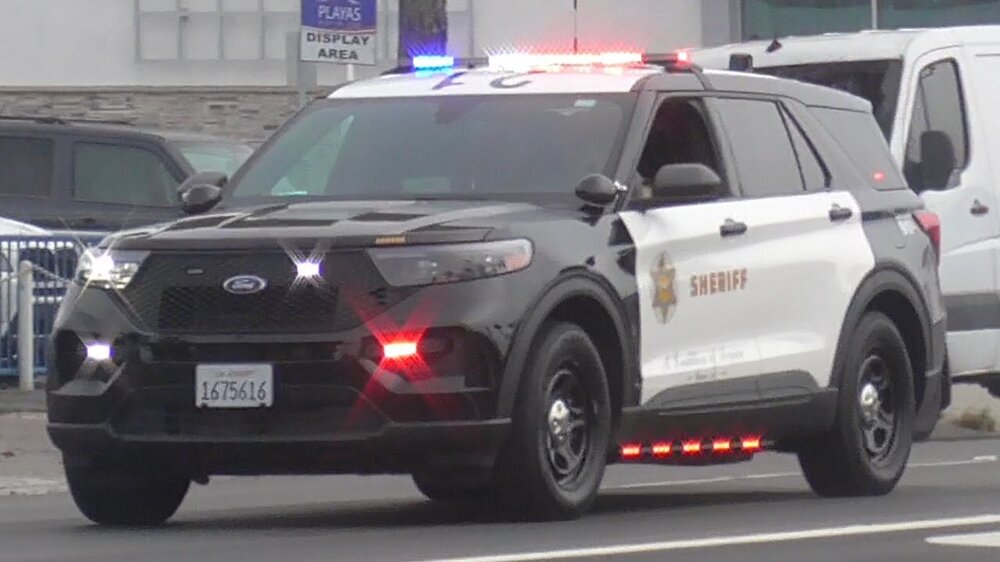 Could contain: vehicle, land vehicle, wheel, tire, text, transport, law enforcement, auto part, sport utility vehicle, vehicle registration plate, police car, outdoor, bumper, ford, motor vehicle, compact sport utility vehicle, emergency service, emergency vehicle, automotive exterior, mitsubishi, crossover suv, roof rack, ford motor company, car, nissan, police, suv, emergency
