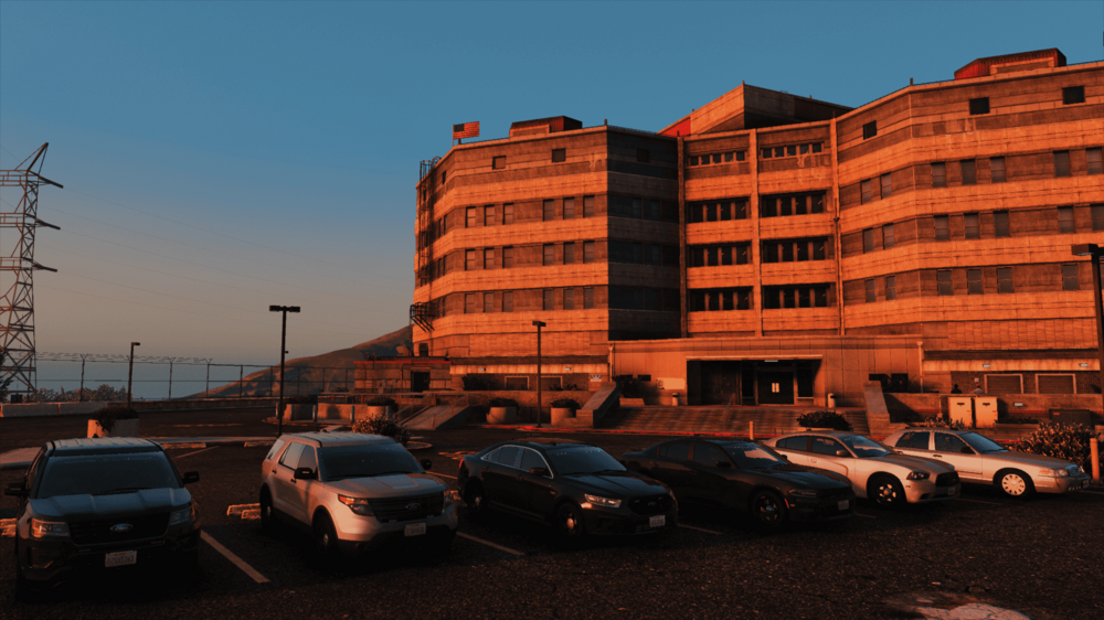 Could contain: outdoor, sky, land vehicle, vehicle, wheel, car, sunset, parked, building, city, parking, ground, tower, street