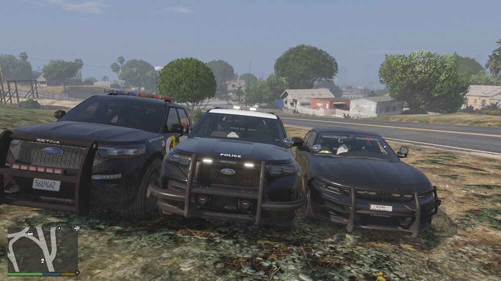 Could contain: outdoor, vehicle, sky, land vehicle, wheel, tire, car, grass, tree, parked, ground