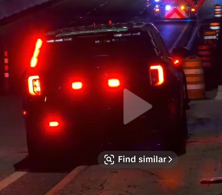 Could contain: vehicle, land vehicle, text, outdoor, automotive lighting, automotive tail & brake light, car, firefighter, light, auto part, red, ground, street, fire