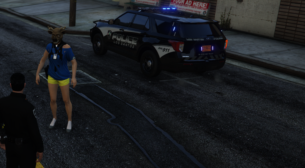 Could contain: vehicle, land vehicle, outdoor, wheel, text, clothing, road, person, tire, car, footwear, street, police, ground